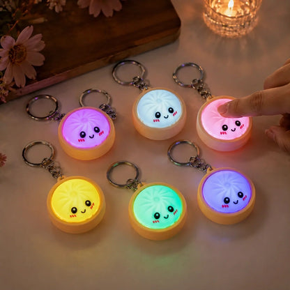 🔥 ÚLTIMO DIA COM 49% DE DESCONTO🔥 Porta-chaves anti-stress em forma de bolinho fofo, que se pode apertar – luz sensível ao toque