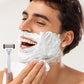 Manual razor with multi-stain blades