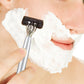 Manual razor with multi-stain blades